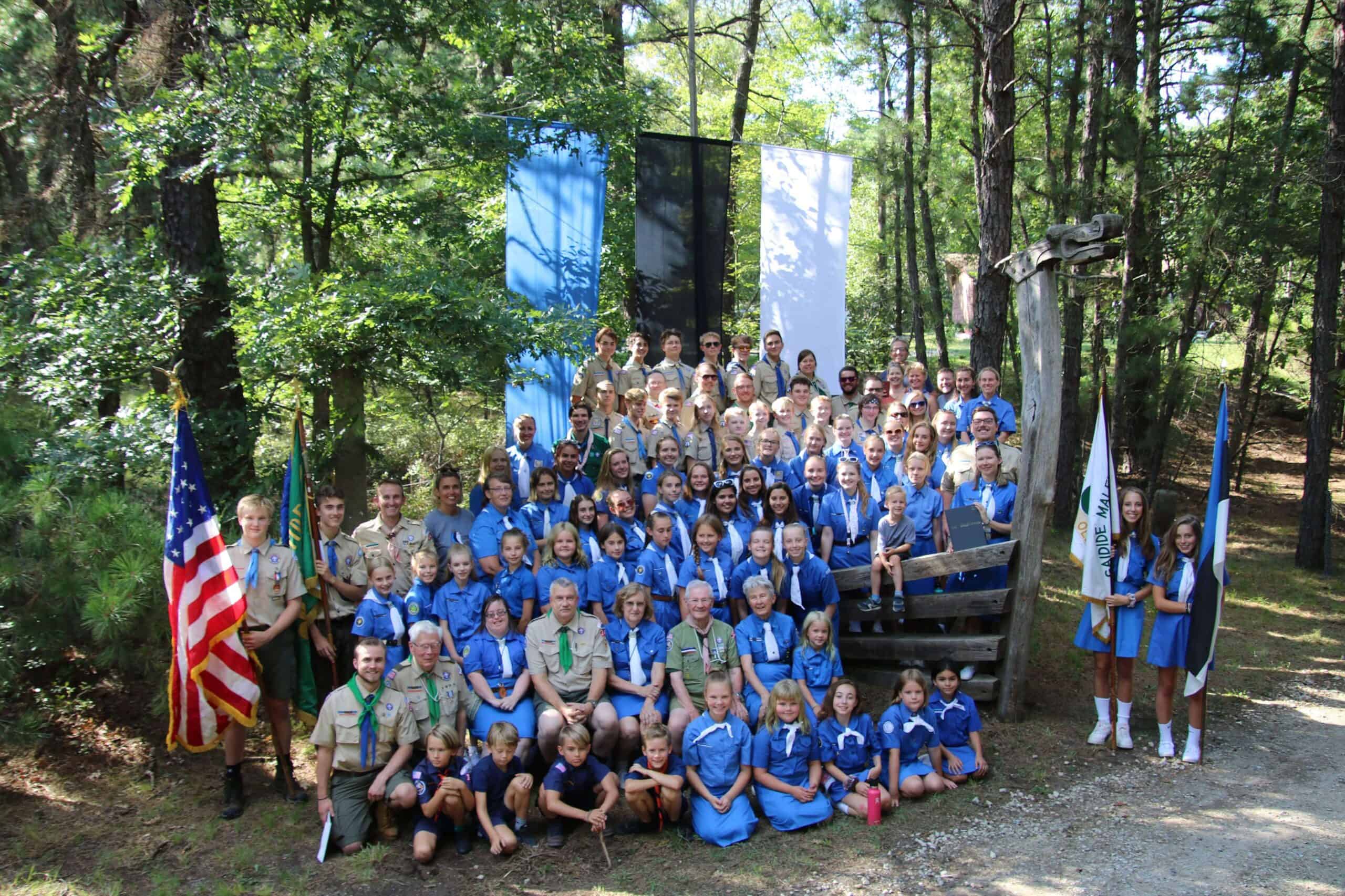 estonian american scouts and guides group picture by camp entrance